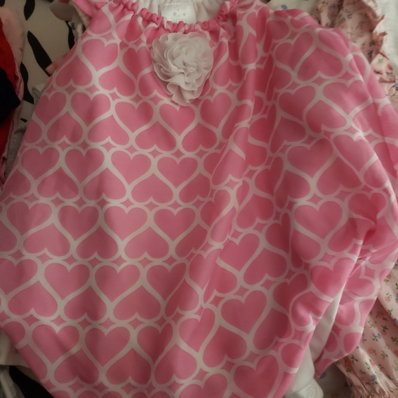 Baby girl clothing bundle newborn to 12 month. Includes bibs, hats, and socks - Picture 11 of 15